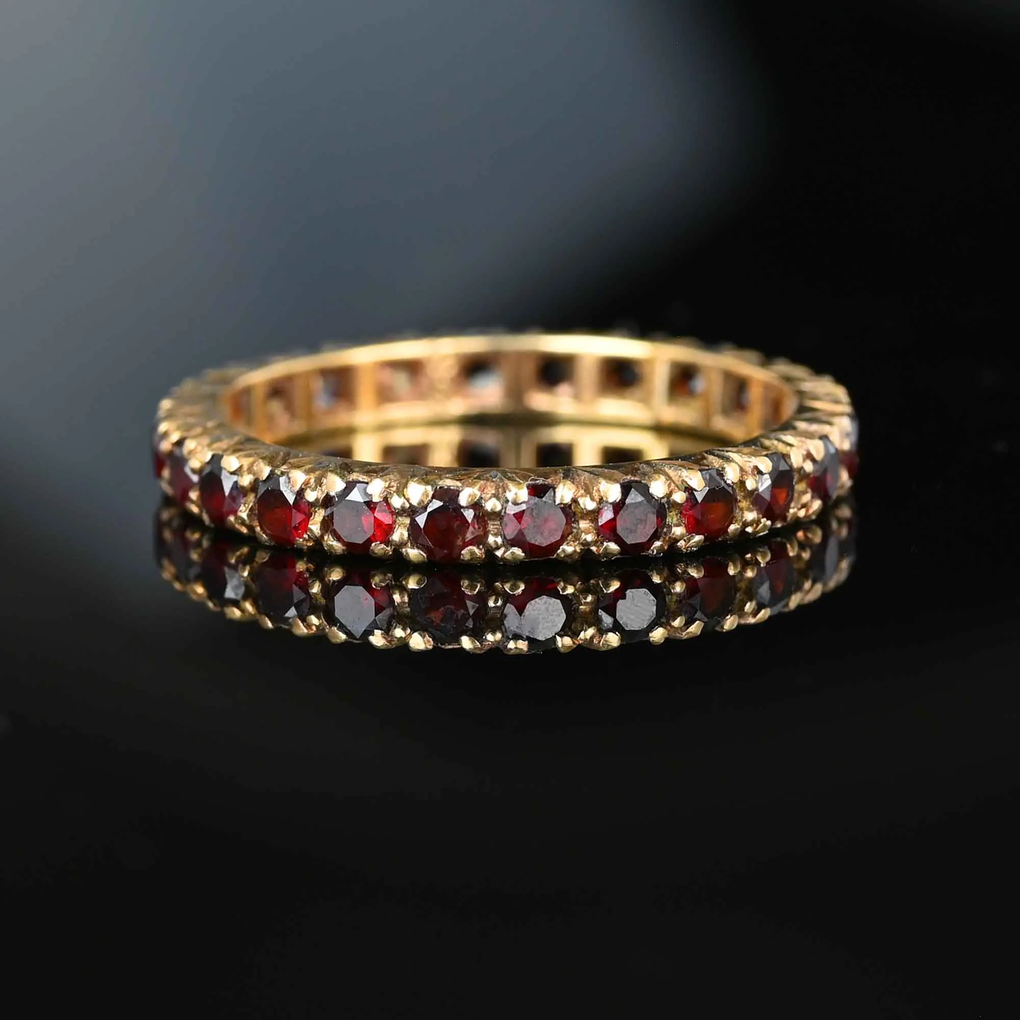 Classic Full Eternity Band Garnet Ring in Gold