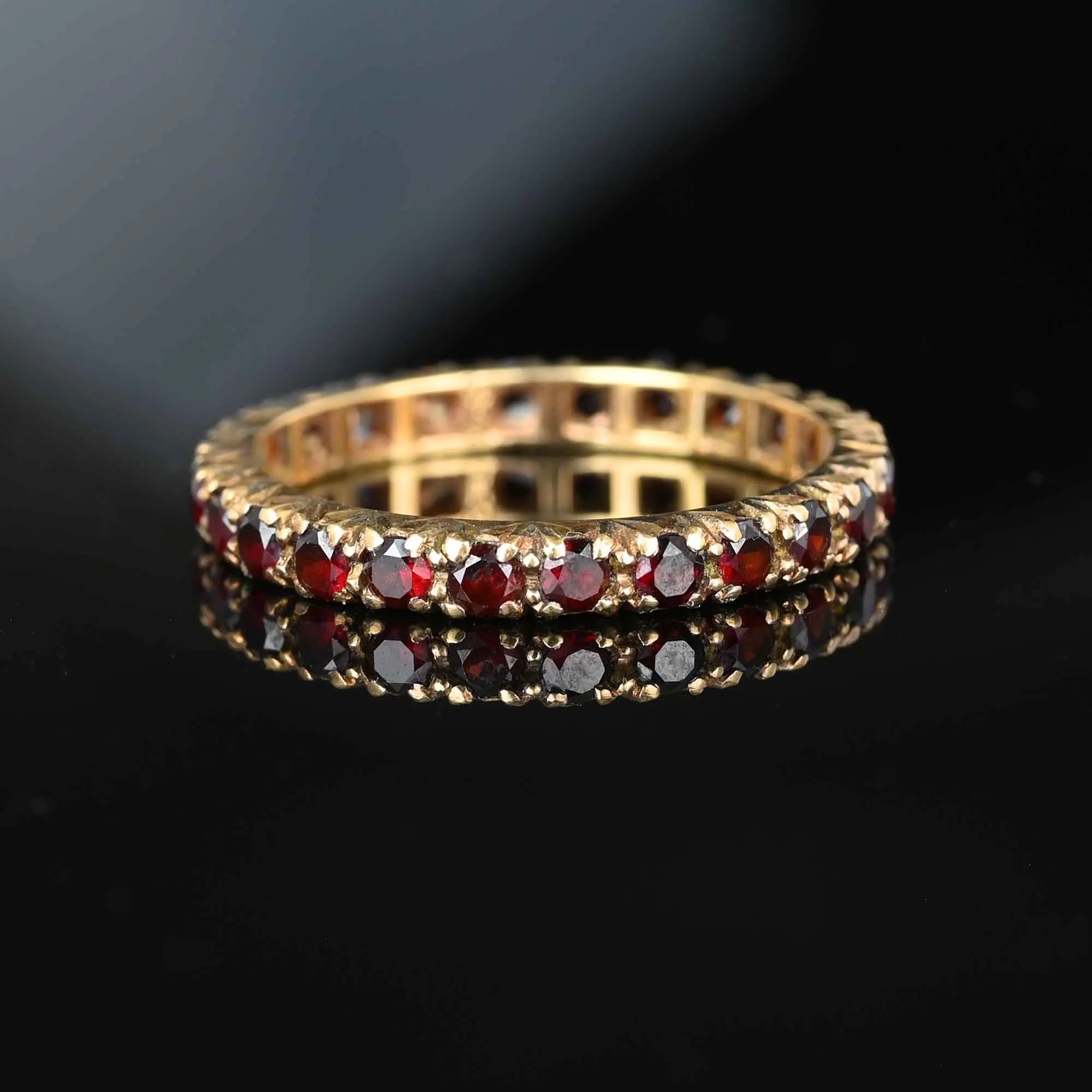 Classic Full Eternity Band Garnet Ring in Gold