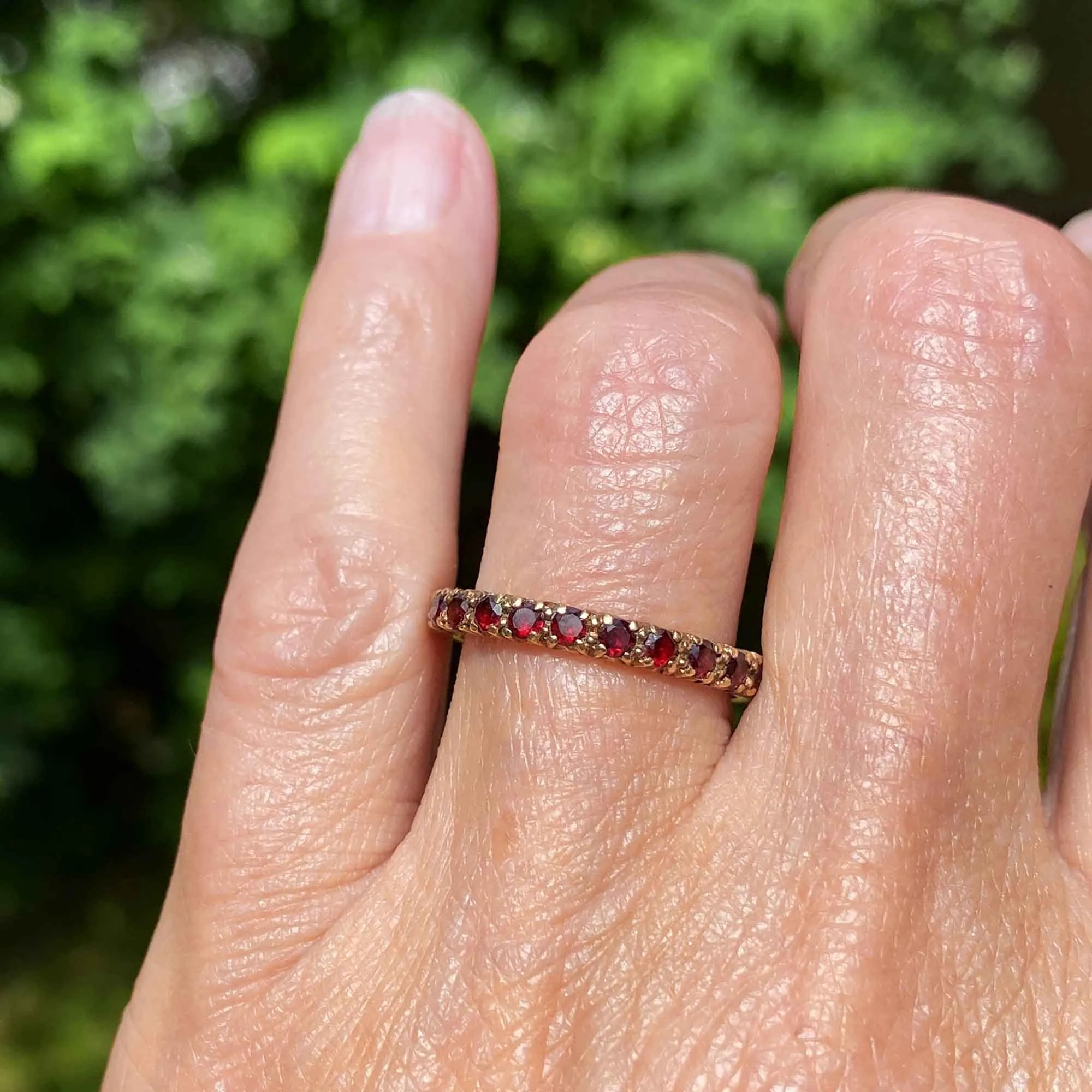 Classic Full Eternity Band Garnet Ring in Gold