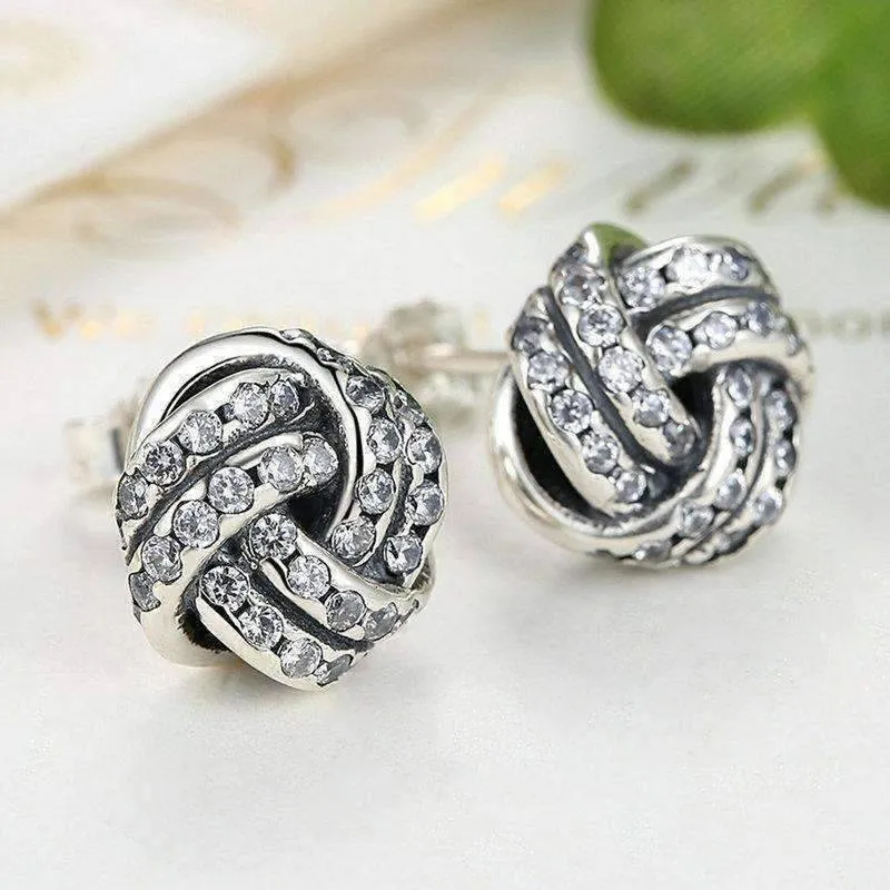 CZ Accented Sterling Silver Love Knot Stud Earrings