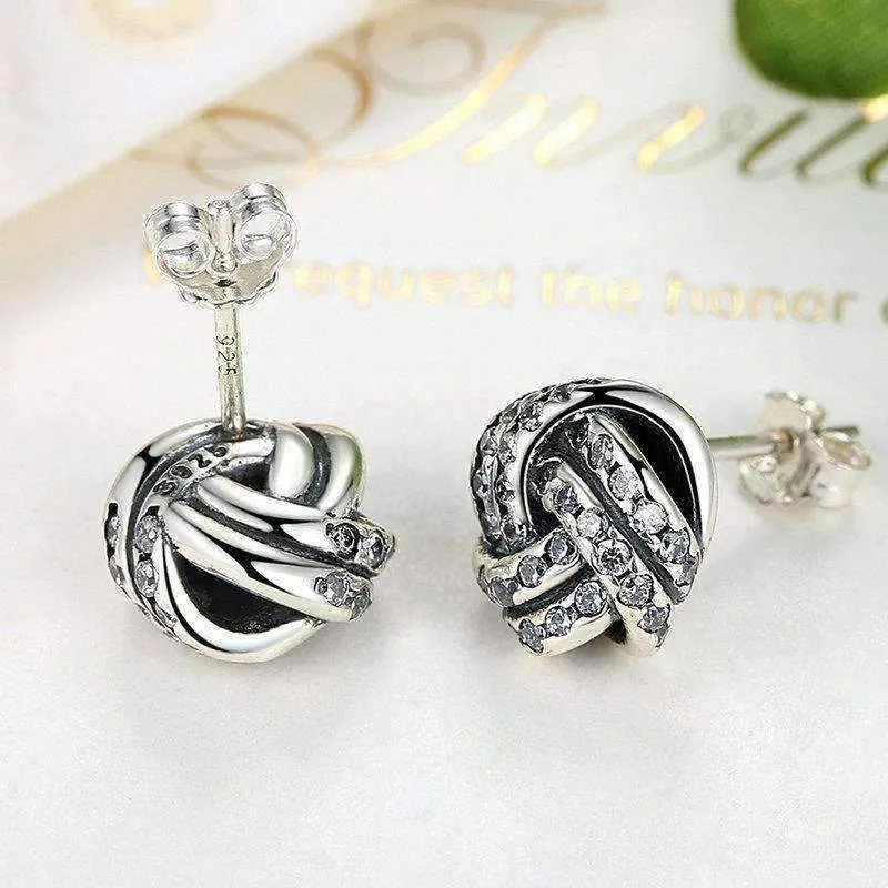 CZ Accented Sterling Silver Love Knot Stud Earrings