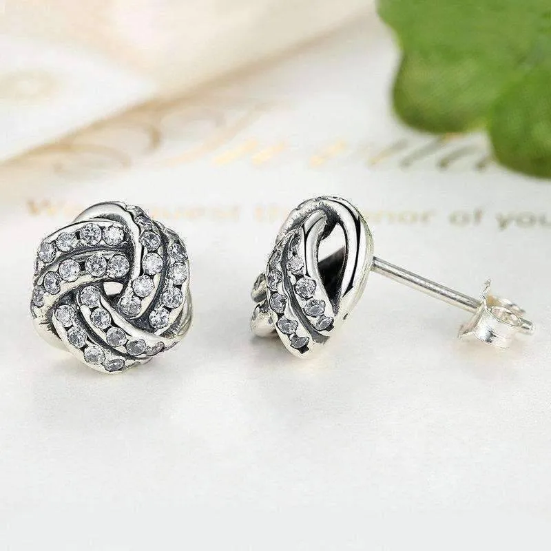 CZ Accented Sterling Silver Love Knot Stud Earrings