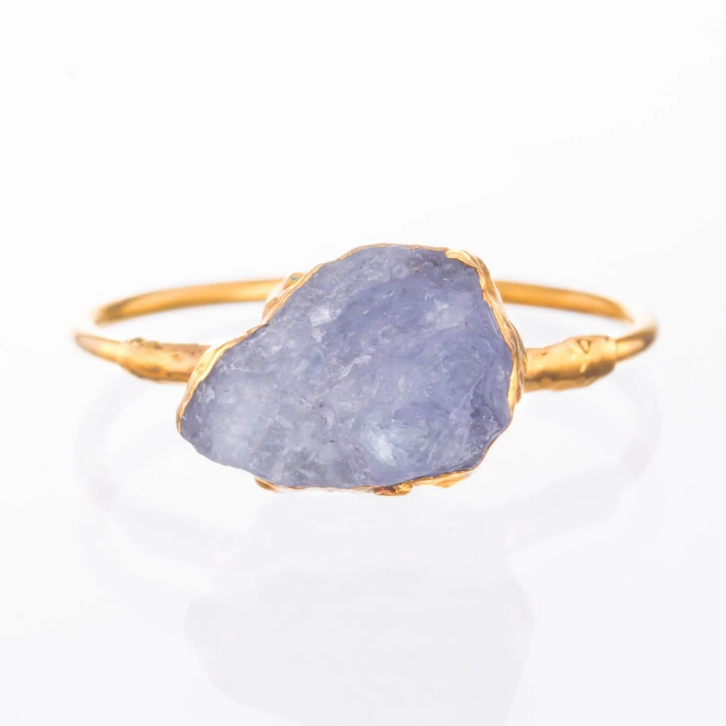 Raw Tanzanite Ring in Yellow Gold, Silver, and Rose Gold