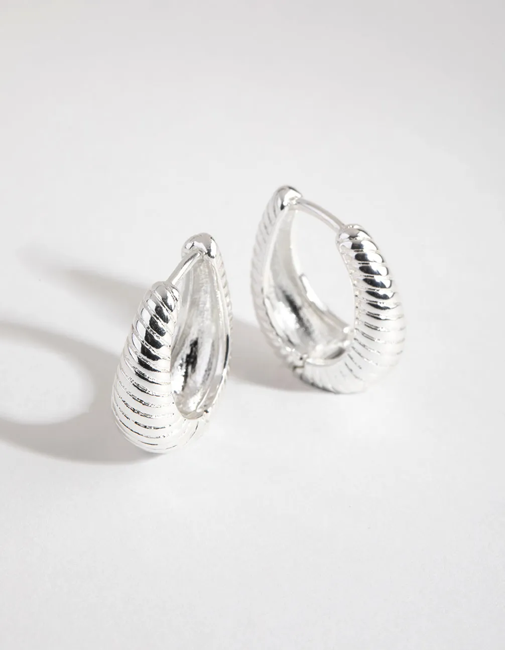 Silver Plated Oval Swirl Huggie Earrings